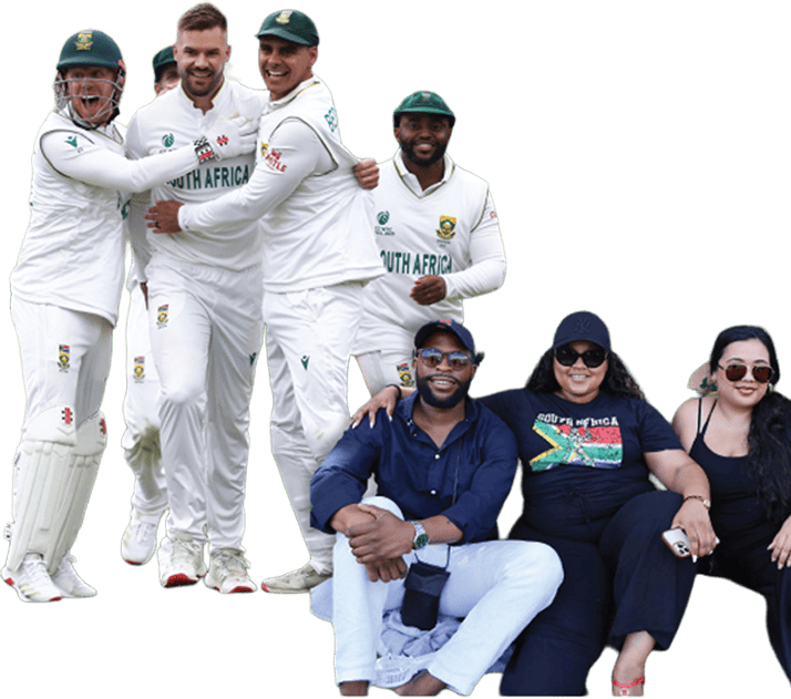 South African cricket players in white uniforms hug in a group with three fans seated in front in casual clothes.